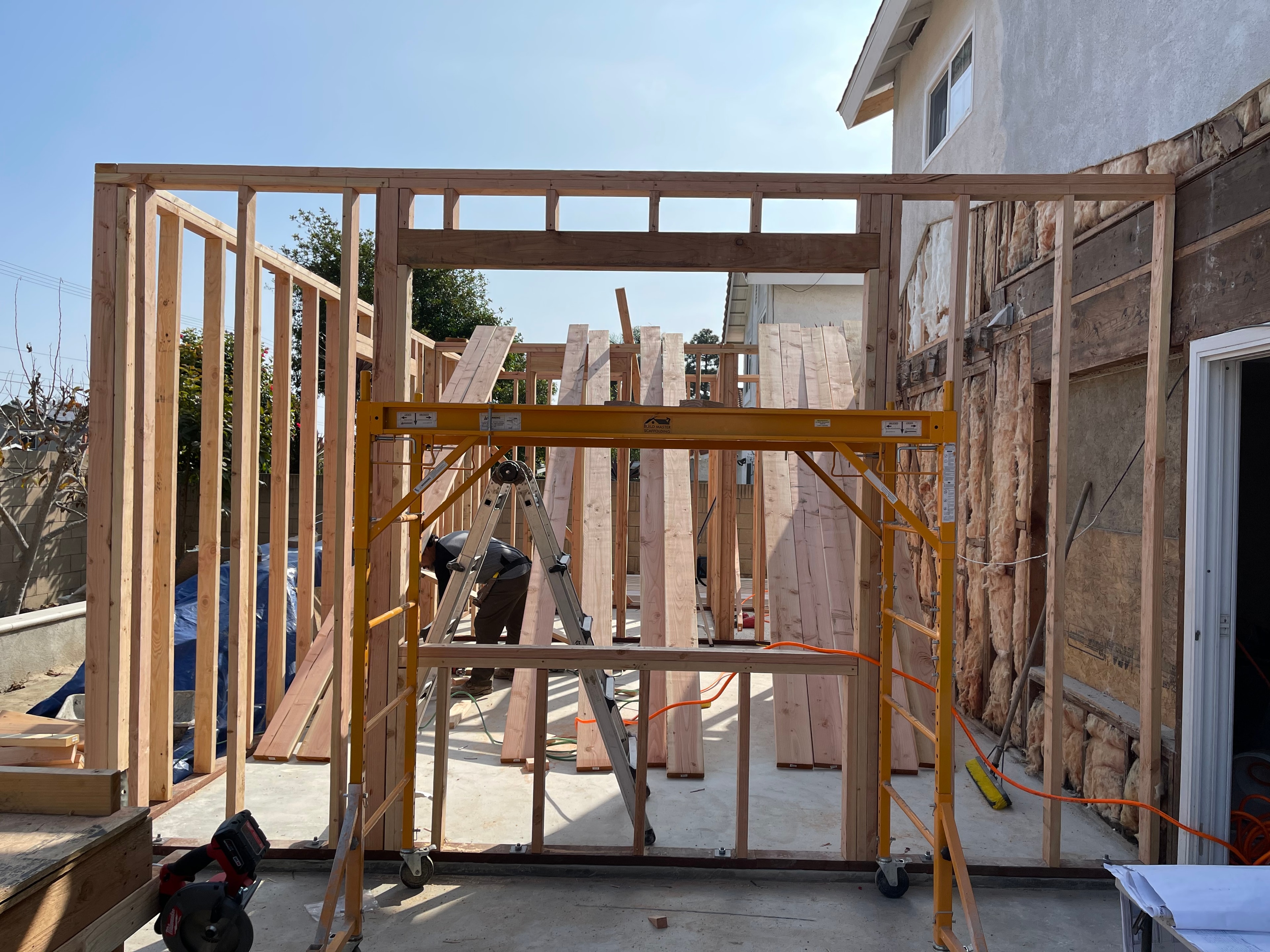 ADU interior framing with crew working